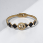 Gold & Black Clover Charm Bracelet