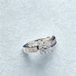 Diamond ring on a light blue textured background