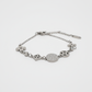 Uniform side view of clover bracelet